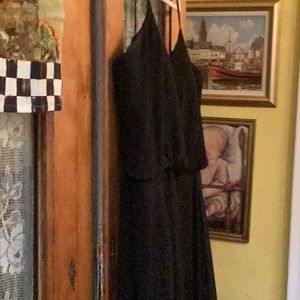 This is a lovely black crêpe gown full length